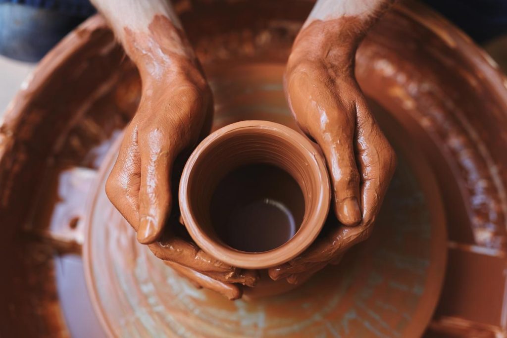 Fingers press, steady and sure, as the soft clay turns into a cup, a pot or a small keepsake